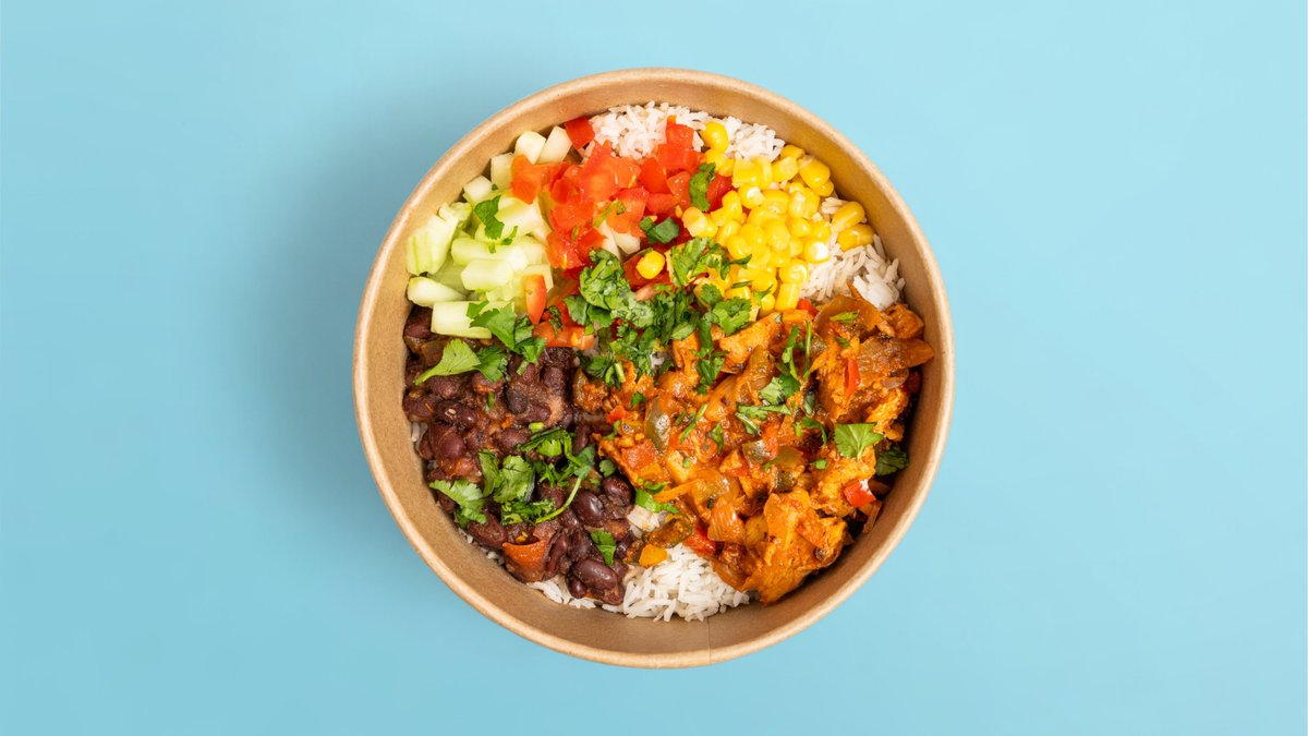 Buena chili rice bowl with chicken, beans, corn and vegetables