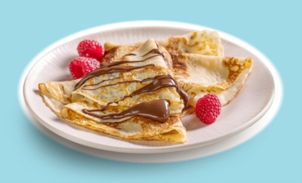 Crêpes with chocolate spread and raspberries